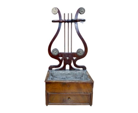 A rare Regency mahogany clay pipe stand, the lyre shaped back over a tobacco draw, 45cm tall. Condition - poor