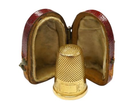 A cased French 18ct gold(eagles head mark) thimble, 4.3 grams. Condition - fair