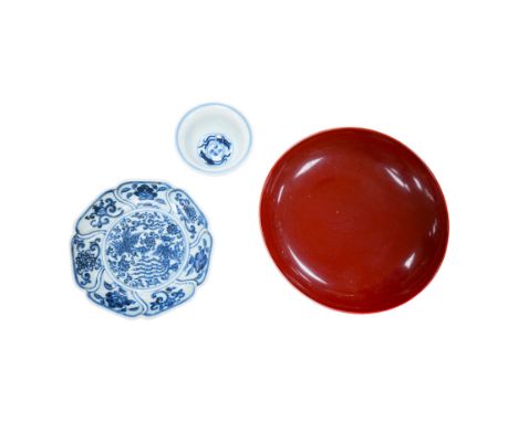 A Chinese copper red glazed dish, a blue and white bowl and a similar dish, bowl 22.5cm diameter. Condition - good Occasional