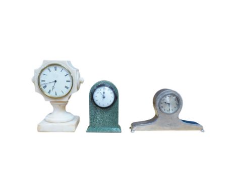 Three small mantel timepieces including a Tudric pewter timepiece, and a French timepiece in an alabaster case, signed Henry 