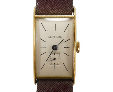A gentleman's 14k gold Longines manual wind wrist watch, with rectangular dial, baton numerals and subsidiary seconds, case d