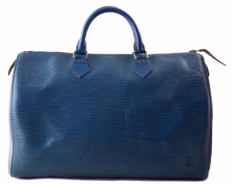 A Louis Vuitton blue Epi Speedy 35 handbag, the textured blue epi leather exterior with smooth leather trim, single patch poc