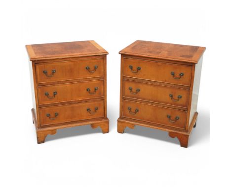 Pair of Georgian design yew wood bedside chests, each fitted with three cock-beaded drawers, on bracket feetDimensions: Heigh