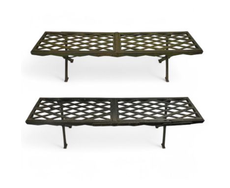Two cast iron garden benches, rectangular seat with lozenge grate panels, on X-framed supports Dimensions: Height:&nbsp;53cm&