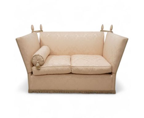 Knole design hardwood-framed drop-arm two-seat sofa, upholstered in cream Damask fabric decorated with repeating foliate patt
