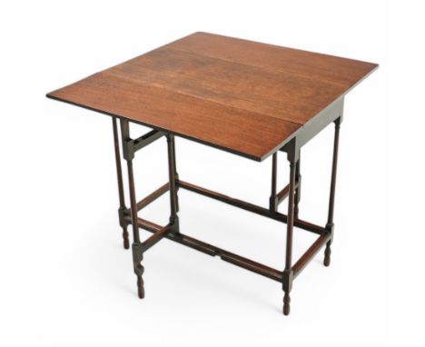 Early 19th century mahogany spider leg table, rectangular drop-leaf top on gate-leg action base, turned supports united by mo