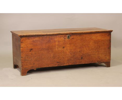 An 18th century oak boarded coffer with hinged lid and interior candlebox, height 43cm, width 108cm, depth 43cm.Buyer’s Premi