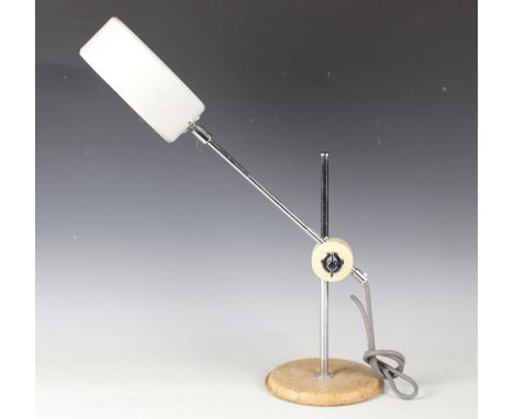 A mid-20th century white enamelled and chromium plated adjustable table lamp, on a stitched leather base, height 60cm.Buyer’s