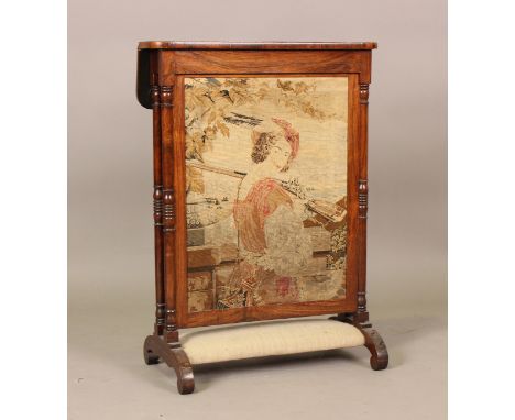 A mid-Victorian rosewood firescreen with hinged top above a needlework panel depicting a huntsman in 17th century costume, on