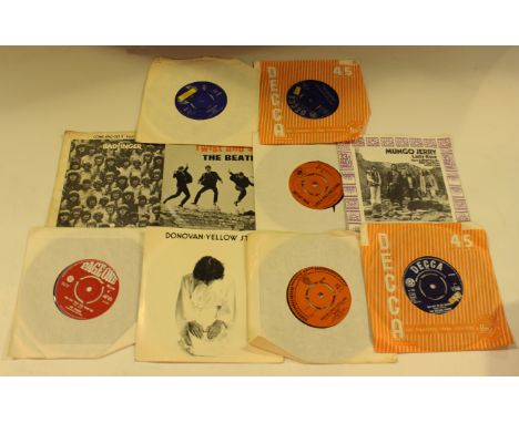 A collection of approximately one hundred and twenty 7-inch records, including singles by Cream, The Rolling Stones and Badfi