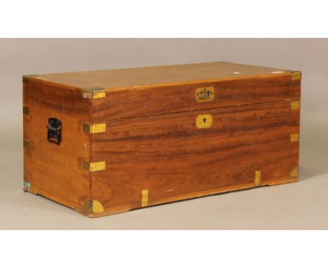A 20th century camphor and brass bound trunk, height 38cm, width 84cm, depth 42cm.Buyer’s Premium 29.4% (including VAT @ 20%)
