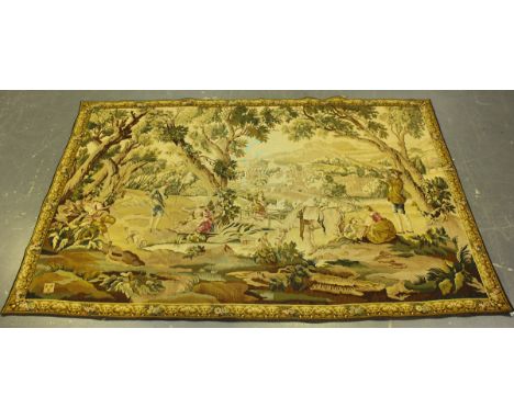 A large 20th century French Aubusson style machine made tapestry wall hanging, depicting a pastoral scene with figures, 179cm