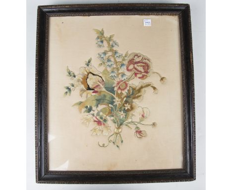 A George III silkwork panel, finely worked with a floral bouquet, 36cm x 31cm, within a period frame.Buyer’s Premium 29.4% (i
