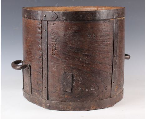 An early/mid-19th century bentwood and metal mounted grain measure, stamped 'Oxon 1835 Dt No 2', height 34cm, diameter 38cm, 