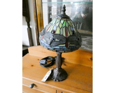 A Tiffany's style dragonfly electric label lamp