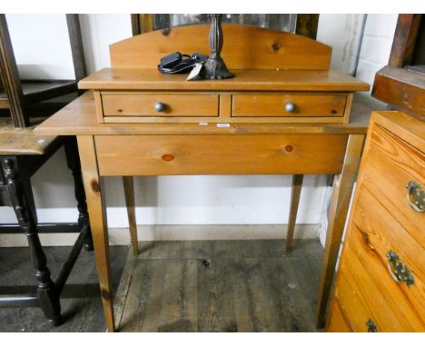 A modern pine dressing table or desk with separate trinket shelf 