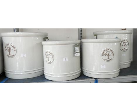Two large ceramic Heritage Garden Pottery flower pots and two slightly smaller Heritage Garden Pottery plant pots  