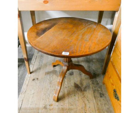 A small oak circular tripod base wine table 