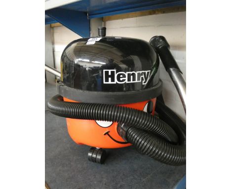 A Henry Hoover with tools but no brush 
