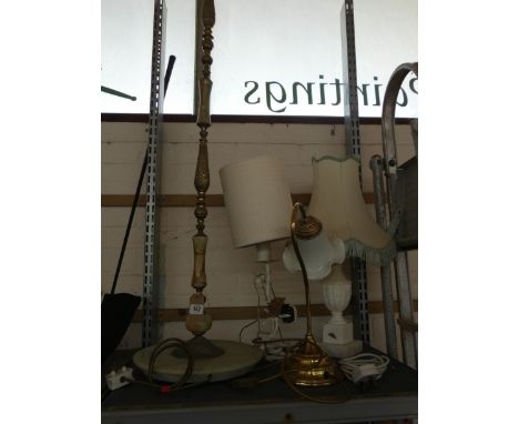 A brass and onyx standard lamp and three table lamps 