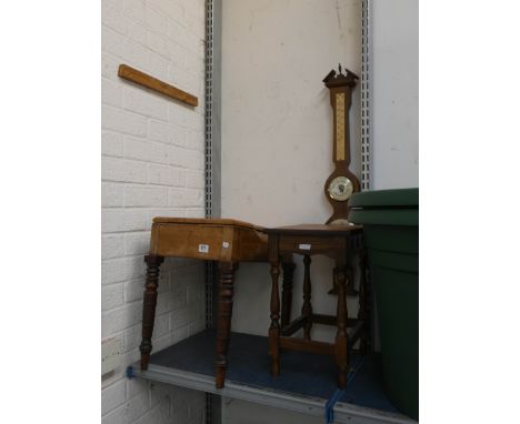 A flip up commode no lining, a small side table and a battery operated barometer 