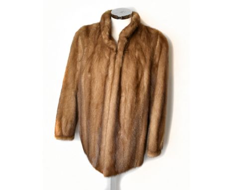 BROWNS OF CHESTER; a short light brown vintage mink jacket with small collar, cuffed sleeves and lined with embroidered satin