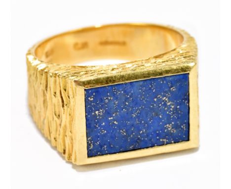 An 18ct gold signet ring set with lapis lazuli, size R, gross 10gAdditional InformationMinor surface scratches but overall th