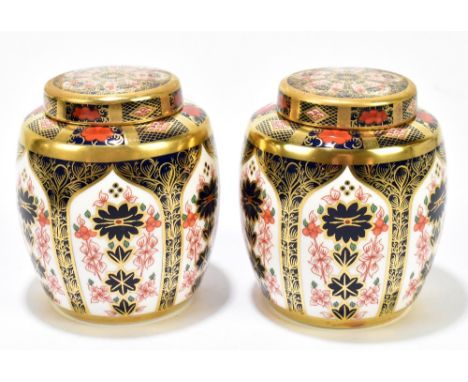 ROYAL CROWN DERBY; a pair of ginger jars and covers decorated in the 1128 pattern, height 11cm (2).Additional InformationEach