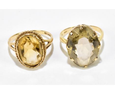 A 14ct yellow gold and citrine set dress ring, the large oval claw set stone measuring 20 x 12mm, size L 1/2, approx. 4.4g, a