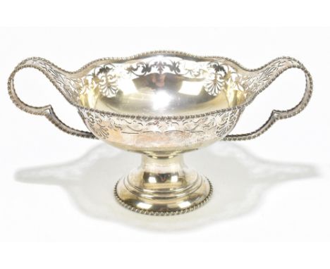 ELKINGTON &amp; CO; a George V hallmarked silver twin handled pedestal bowl with cast rope twist rim and pierced floral decor