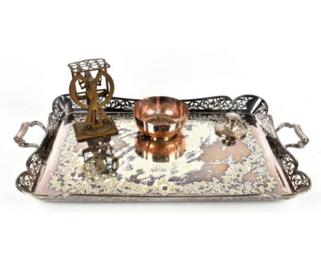 A large Edwardian silver plated twin handled tray, with pierced serpentine sides, engraved initials and date 1906 to the cent