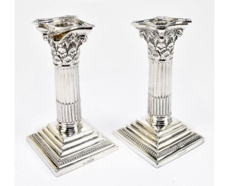 MAPPIN &amp; WEBB; a pair of Victorian hallmarked silver Corinthian column candlesticks, Sheffield 1895, height 16.5cm (weigh