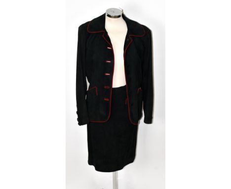 YVES SAINT LAURENT; a 'Rive Gauche' vintage 1980s bottle green lambskin suede jacket, with large black embroidered buttons to