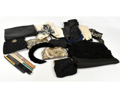 A small vintage black beaded bag with metal frame with foliate design top and chain handle, two 1950s sequinned evening clutc