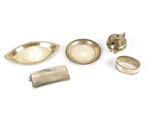 An Edwardian hallmarked silver calling card case, Birmingham 1912, length 8cm, with a silver mustard, napkin ring, circular d