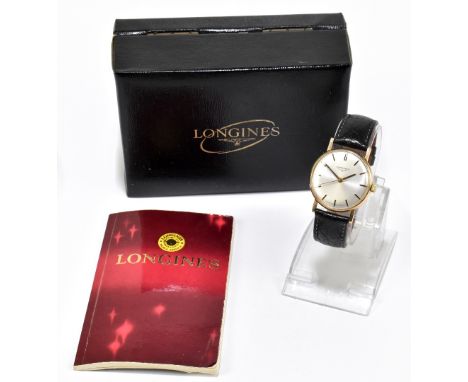 LONGINES; a gentleman's 9ct yellow gold vintage wristwatch, with baton markers to the circular dial and with seventeen jewel 