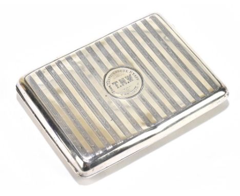 ROBERT CHANDLER; an George V hallmarked silver cigarette case of rectangular form with engine turned linear decoration and ce