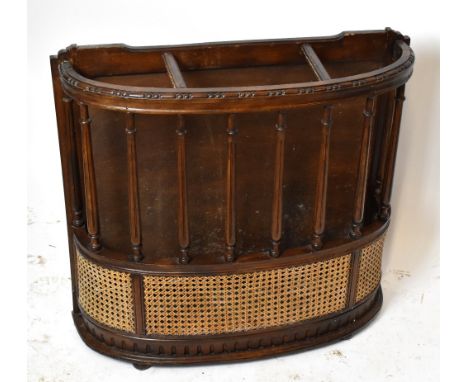 A reproduction three division stick stand with rattan applied detail to the base section, width 73cm, depth 23cm, height 64cm