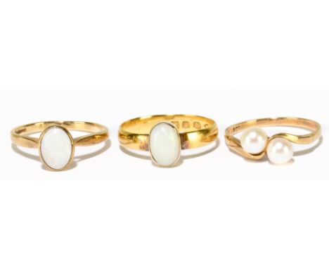 A 22ct yellow gold and opal ring, size N 1/2, approx 2.4g, and two 9ct yellow gold rings, one set with opal, one set with two