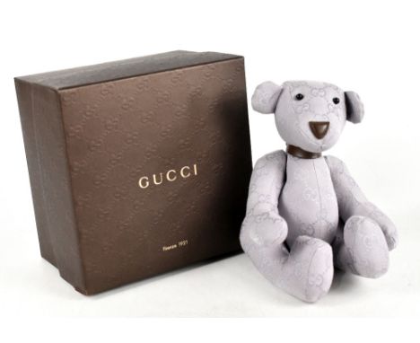 GUCCI; a 'GG' monogram canvas lavender teddy with embossed logo brown leather trim collar, brown leather nose and bead eyes, 