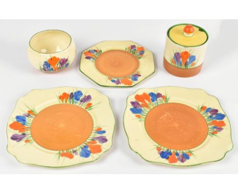 CLARICE CLIFF; five pieces decorated in the 'Crocus' pattern, comprising preserve jar and cover, height 8.5cm, bowl, octagona