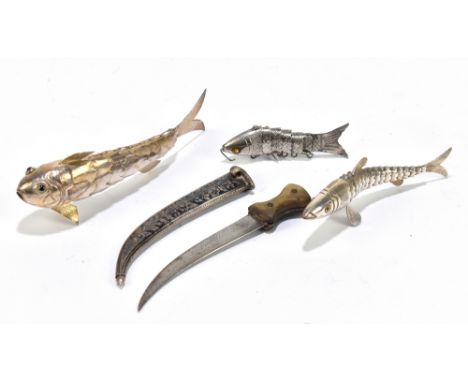 Three white metal articulated fish, longest 10.5cm, with a model jambiya knife with horn handle and white metal and niello sc