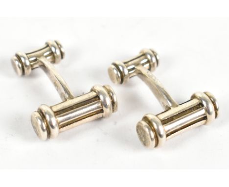 TIFFANY &amp; CO; a pair of barrel shaped silver cufflinks, with a fixed bar, no box, length 22mm.Additional InformationBoth 
