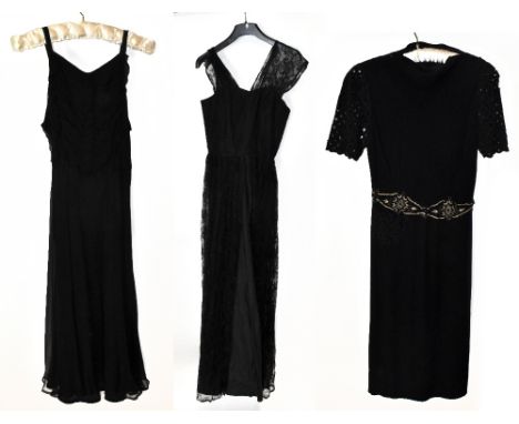 A 1930s full length black silk and handmade lace evening gown with boned bodice, side zip and full skirt, with a black lace o