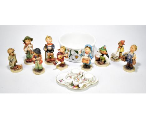 GOEBEL; a collection of nine Hummel figures including Postman, Little Hiker, Playmate, etc, also a Royal Crown Derby miniatur