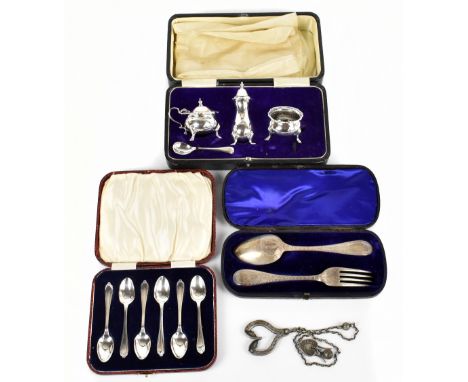 REED &amp; SONS; a Victorian hallmarked silver two piece christening set comprising spoon and fork, with chased decoration, N