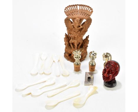 A mixed lot of collectors' items including decorative Chinese style erotic head seal, eleven assorted mother of pearl spoons,