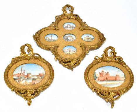 INDIAN SCHOOL, EARLY 20TH CENTURY; a set of seven watercolour on ivory miniatures, views of palaces and ruins, framed as thre