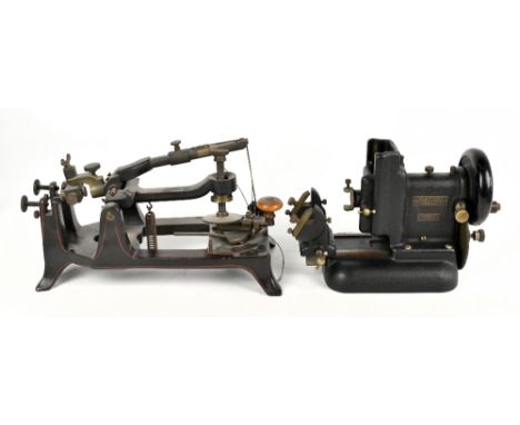 JUNG HEIDELBERG; a cast iron and brass microtome, with sprung mechanism and turned wood handle, length 36cm, with a Rapide au