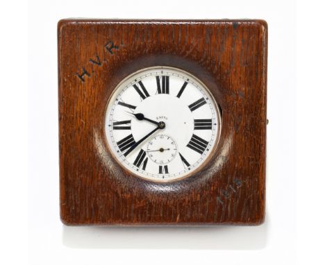 A nickel silver Goliath eight day crown wind pocket watch with Roman numerals to the white enamel dial and subsidiary seconds